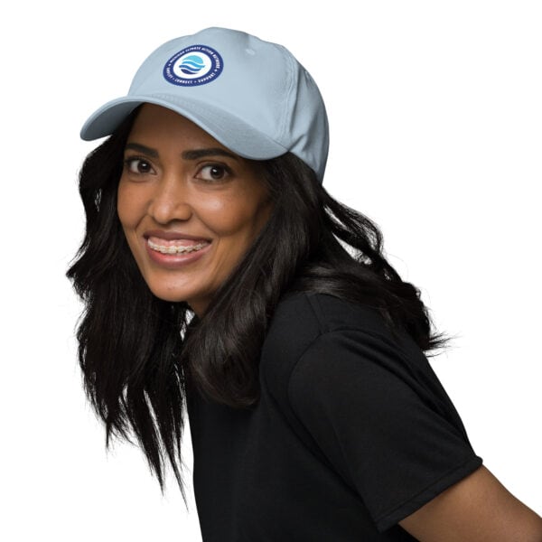MiCAN Cap logo on light blue baseball cap.