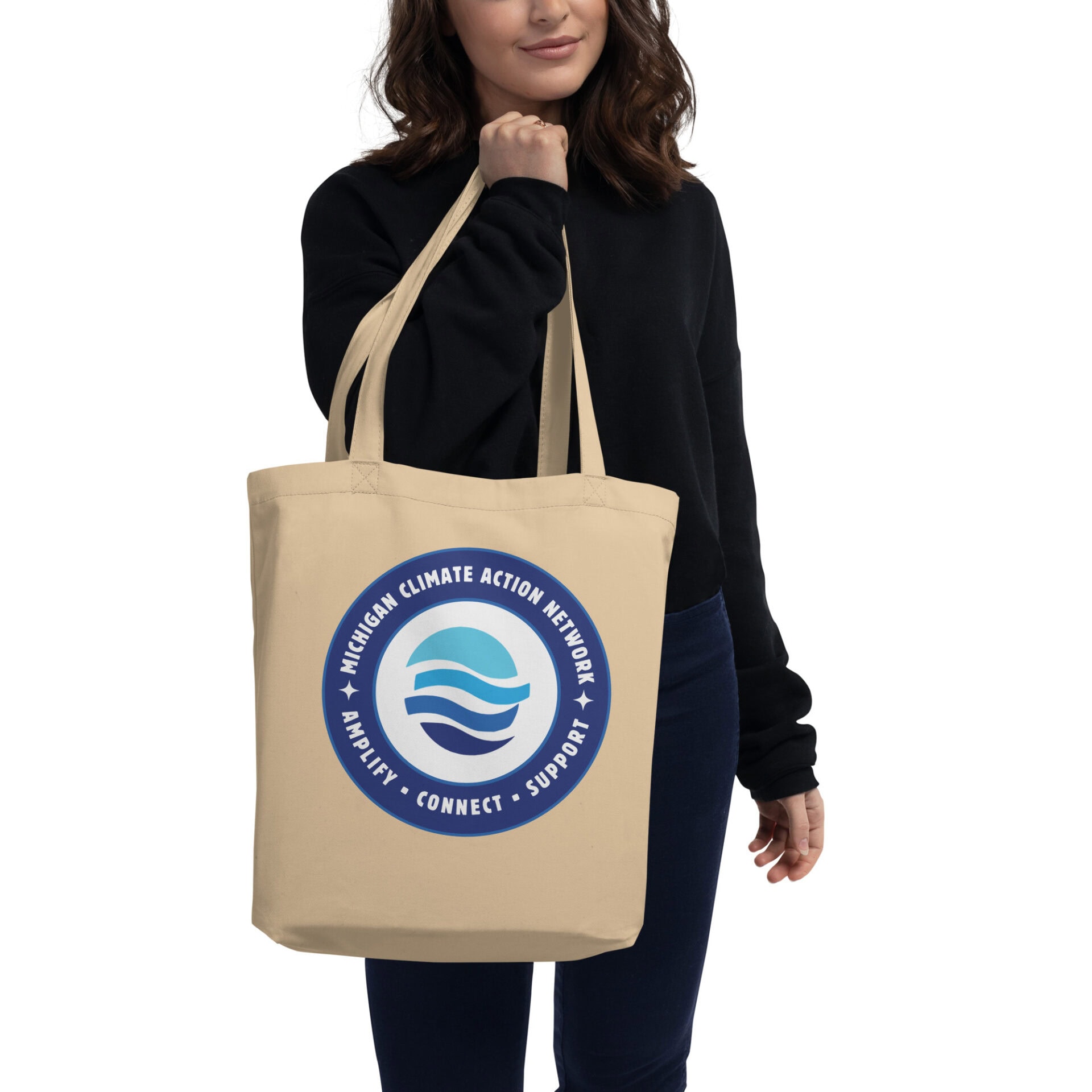 Highland Climate Action Network tote bag with logo featuring waves and text.