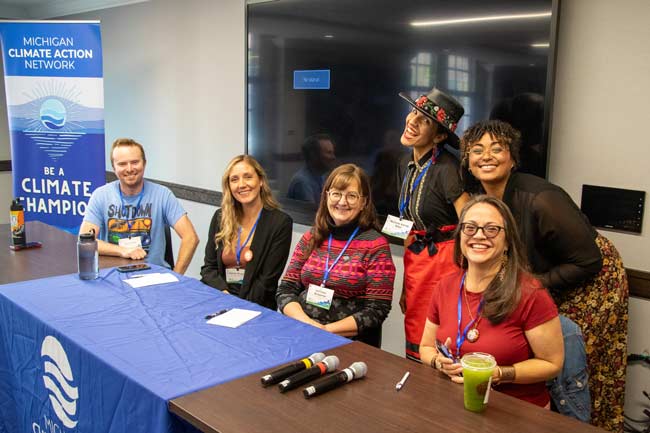 Climate action network Michigan, environmental organization, community climate leaders at conference.